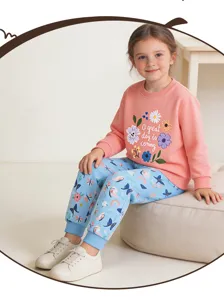 Detailed view of cute kids floral print sweatshirt and butterfly jogger pants set.