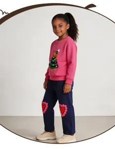 Children autumn crewneck sweatshirt and sweatpants set with cute Christmas tree patch details.