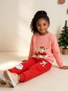Cute girls Christmas sweatshirt and pants set with reindeer and Santa appliques for autumn.
