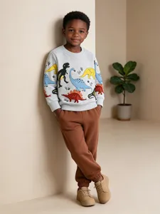 Kinderen herfst dinosaurus print sweatshirt set, comfortabele lange mouw top met bruine broek.