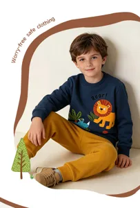 Detailed view of cute boys long sleeve crewneck sweatshirt featuring fun animal print designs.