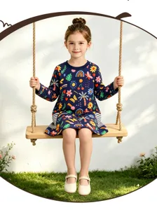 Detailed view of girls long sleeve dress with colorful cartoon plant prints on swing scene.