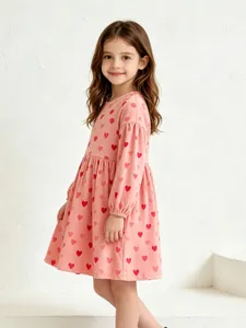 Girls long sleeve pink dress with cute red heart print for autumn daily wear and parties.