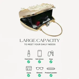 Evening clutch bag with pearl floral decor and metal ring handle showing large daily storage capacity.
