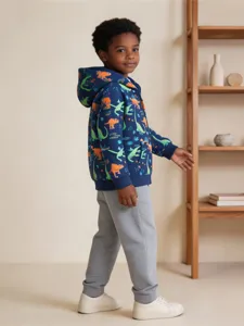 Cardigan con cappuccio stampa dinosauro da ragazzo con pantaloni grigi autunnali