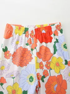 Cute floral print girls leggings featuring elastic waistband and comfortable knit cotton fabric for summer.
