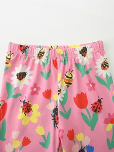 Süße rosa Mädchen Leggings mit niedlichen Marienkäfer und Blumen Mustern für den täglichen Sommer.