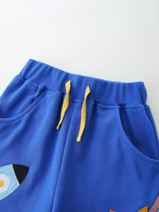 Kids casual cotton knit shorts with yellow drawstring and cute cartoon patch for summer daily wear.