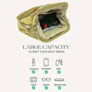 Detailed view of the shiny gold metallic clutch interior, showing spacious daily capacity.