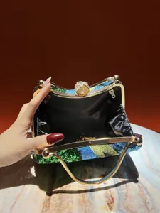 Exquisite sequin embroidered evening clutch bag with metal frame and pearl rhinestone clasp detail.