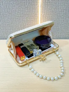 Pleated satin evening clutch bag with elegant pearl handle and gold frame for women.