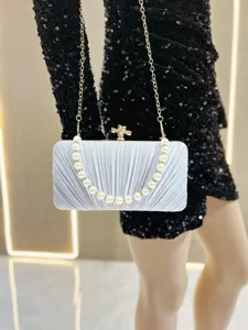 Elegant pleated satin evening clutch with pearl handle detail for formal dress events.