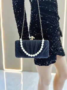 Black pleated satin evening clutch bag with pearl handle and metal chain for women party dress.