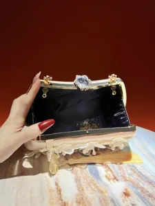 Elegant Chinese style satin evening clutch bag with crystal clasp, lace trim and delicate tassel.