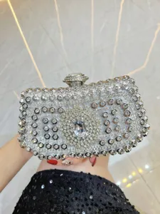 Exquisite rhinestone evening clutch bag detail, sparkling crystal bridal party shoulder purse.