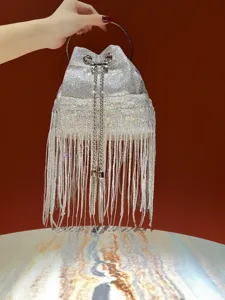 Silver sparkly fringe bucket bag with metal ring handle for women evening party events.