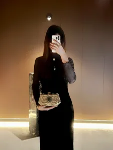 Elegant rhinestone evening clutch bag detail shot, sparkling crystal design for luxury party.