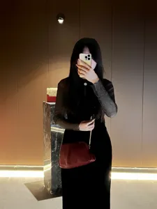Stylish soft ruched cloud clutch bag with metal chain strap for women elegant evening party.