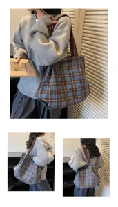 Detailed view of the vintage plaid tote bag, showing its large capacity and strap design.