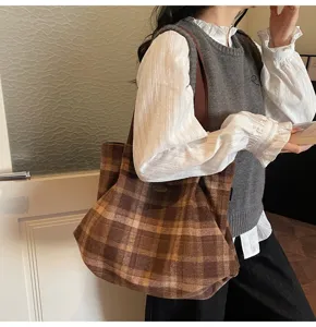Vintage plaid shoulder tote bag for women, classic brown pattern casual commuter handbag.