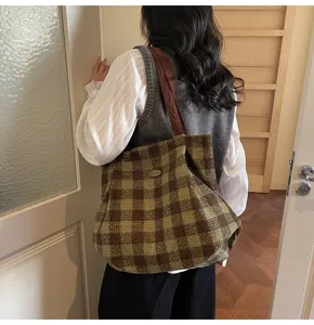 Detailed view of women retro plaid canvas tote bag, large capacity casual shoulder bag.