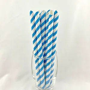 Blue and white striped paper straws set in a clear glass cup, eco-friendly and disposable.