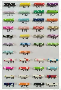 Detailed view of assorted colorful paper straw patterns, dots and stripes styles for parties.