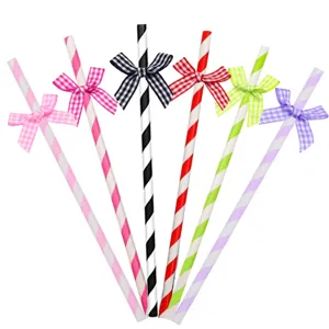 Colorful striped paper straws with gingham bows, perfect for party and birthday decor.