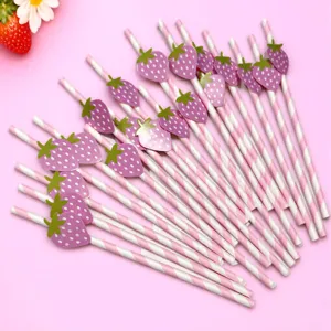 Pink striped paper straws with cute purple strawberry decorations, ideal for parties and drinks.