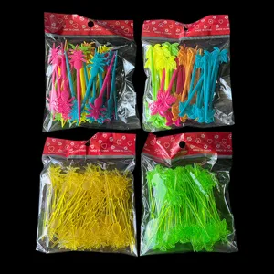 Disposable plastic fruit forks with pineapple and palm tree shapes for party cake decoration.