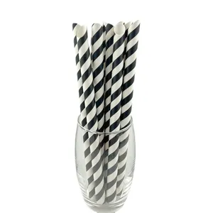 Disposable black and white striped paper drinking straws for milk tea, juice, and party drinks.