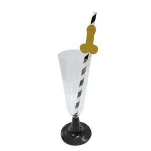 Bachelorette party novelty paper straws with gold glitter funny shape and plastic champagne glass.