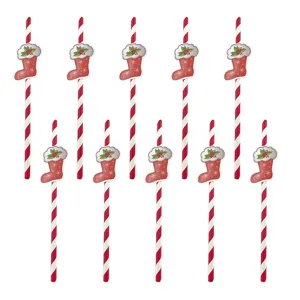 Nahaufnahme von rot-weißen Papptrinkhalmen mit weihnachtlichen Stiefel-Motiven als Detail.