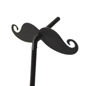 Close-up detail of the funny black mustache drinking straw, perfect for party decoration use.