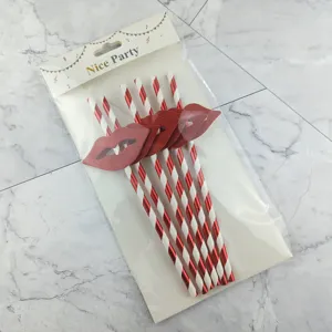 Disposable paper straws with red lip decorations, red and white striped party drink straws.