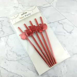 Detailed shot of red apple decorative party straws in packaging, perfect for celebrations.