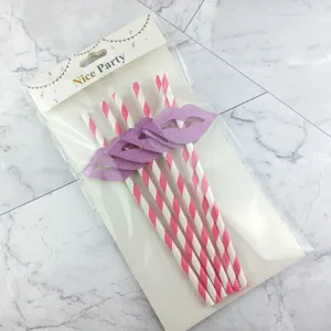 Pink striped paper straws with glitter lips decor, perfect for party drinks and cake.