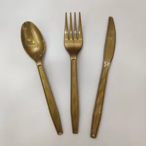 Disposable plastic cutlery set gold spoon fork knife for party table setting daily details.