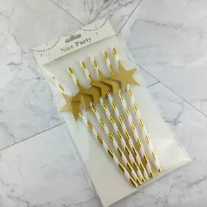 Gold star paper straws with white striped design for party drinks and celebration decor.