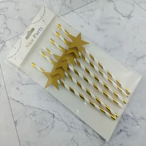 Biodegradable paper straws with gold glitter stars, perfect for birthday party drink decorations.
