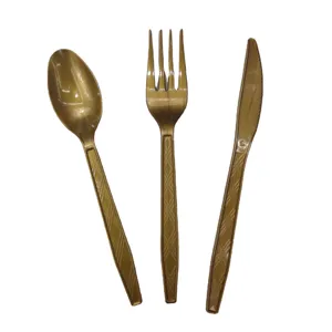 Gold disposable plastic cutlery set, elegant fork, knife and spoon for party events.