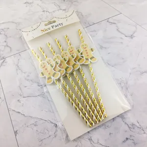 Christmas paper straws set with cute gingerbread man decorations for holiday party and drinks.