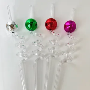 Detailed view of colorful plastic reusable straws with shiny mirror disco ball and spiral shape.