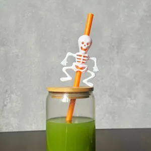 Halloween party decoration plastic straw with cute white skeleton design detail shot.