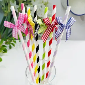 Colorful striped paper straws with lovely checkered bows, perfect for party and dessert table decor.