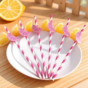 Pajitas de papel a rayas rosas y blancas con bonita decoracion de limon para fiestas y bebidas.