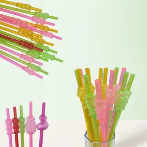 Close-up details of colorful reusable plastic drinking straws with cute animal and fruit shapes.