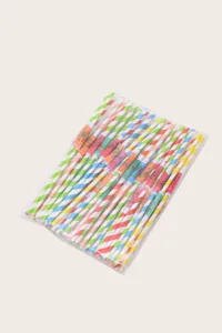 Detailed shot of colorful striped paper drinking straws featuring fun mini cocktail umbrellas.