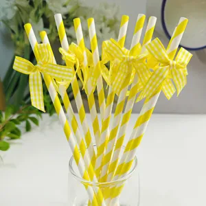 Yellow and white striped paper straws with cute grid bows, perfect for party and dessert decor.