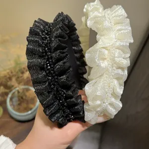 Detailed view of pleated lace headbands with beaded details, sweet style hair accessories.